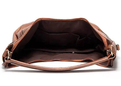 Minervas klassische Vielseitigkeit | Vintage Leder Tasche