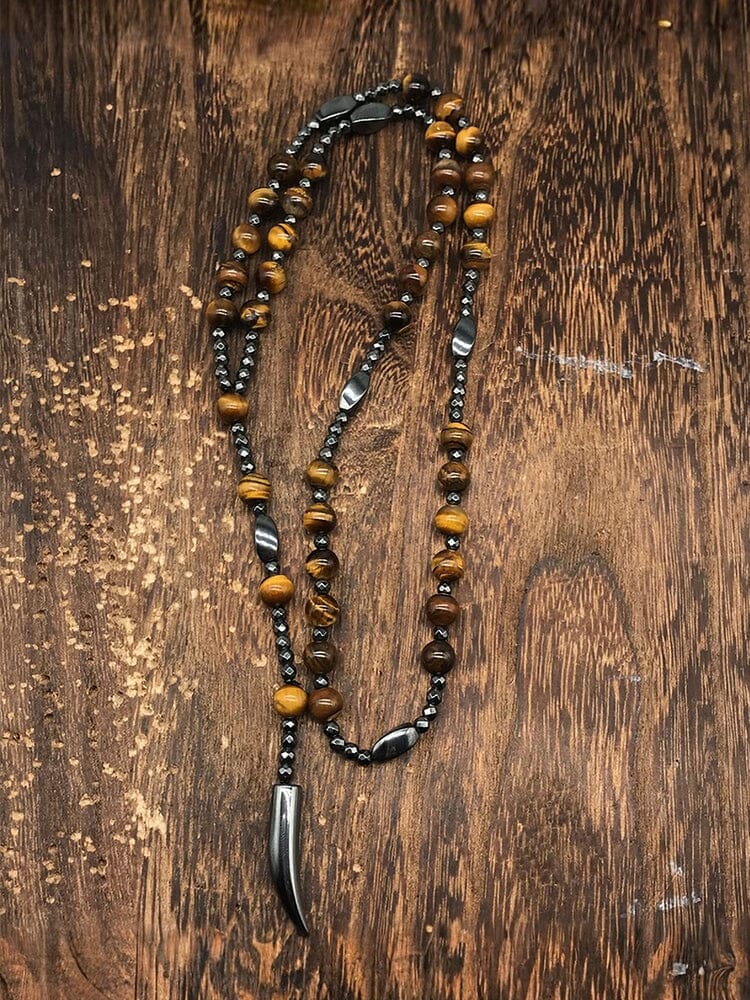 Collana con pendente a croce in pietra naturale