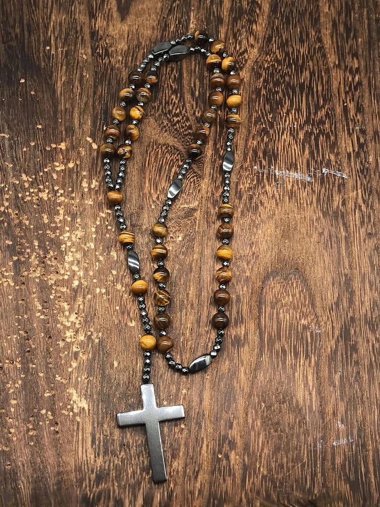 Collana con pendente a croce in pietra naturale