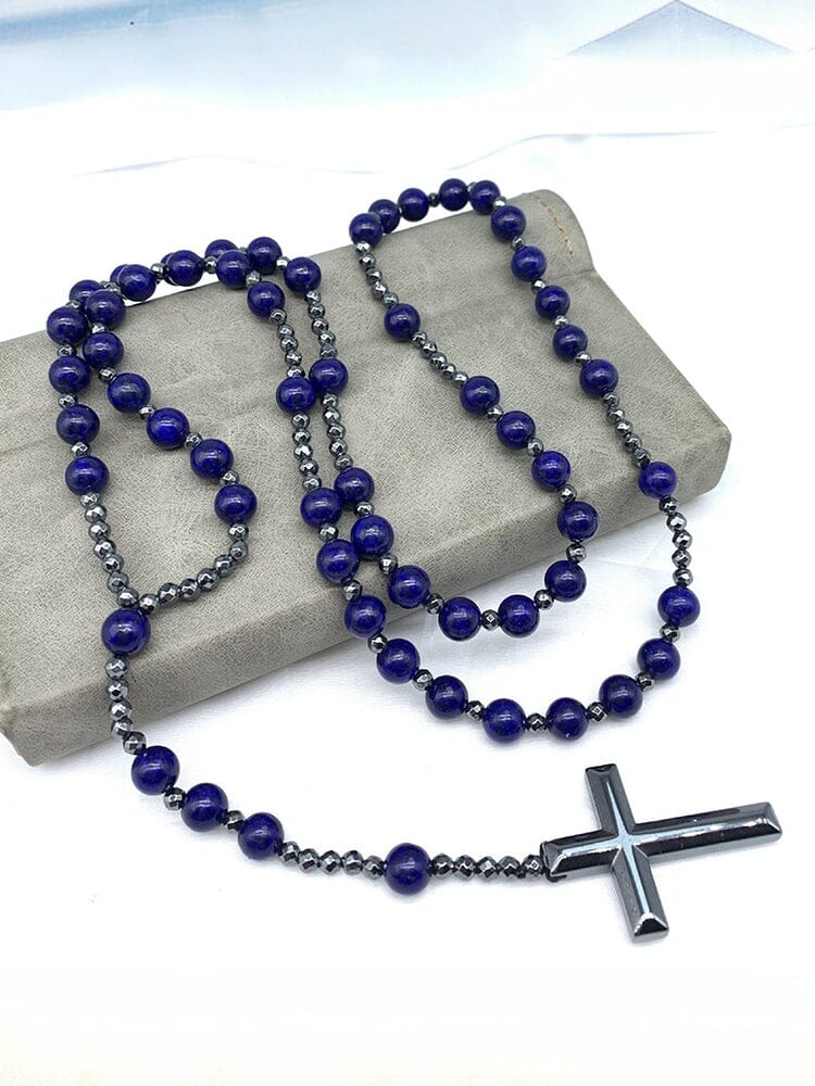 Collana con pendente a croce in pietra naturale