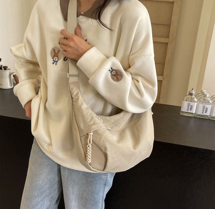 Zaino a tracolla con molteplici tasche