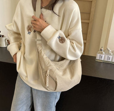 Zaino a tracolla con molteplici tasche